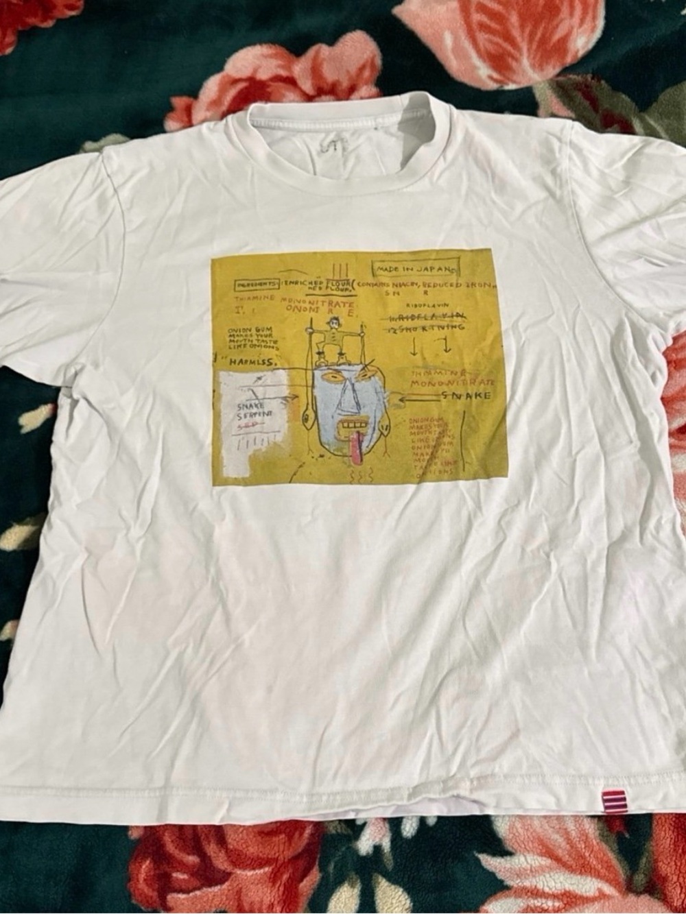 White UNIQLO x Jean-Michel Basquiat 'Onion Gum' UT graphic t-shirt.